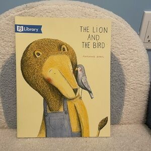 The Lion and the Bird by Marianne Dubuc - Yellow Cover